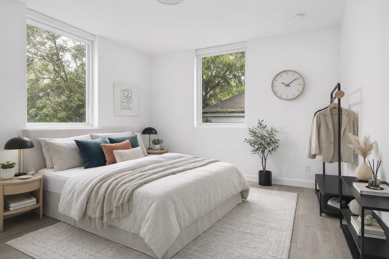 Private bedroom with dual windows and natural light at Capitol Living